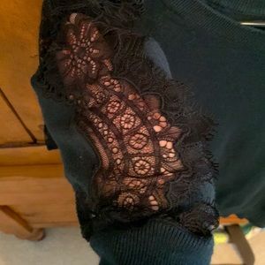 Sophisticated dark green Loft sweater, M, w black lace detail on each arm.